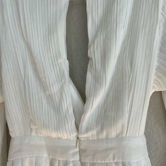 Embrace Your Beauty Ivory Pleated Long Sleeve Skort Romper - Picture 4 of 9